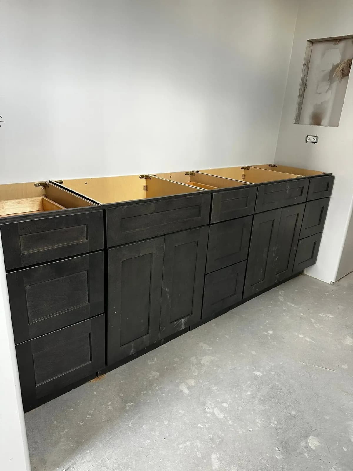 Cabinet installation progress for a remodeling project by Ramos Cabinetry and Construction in Scottsdale, AZ