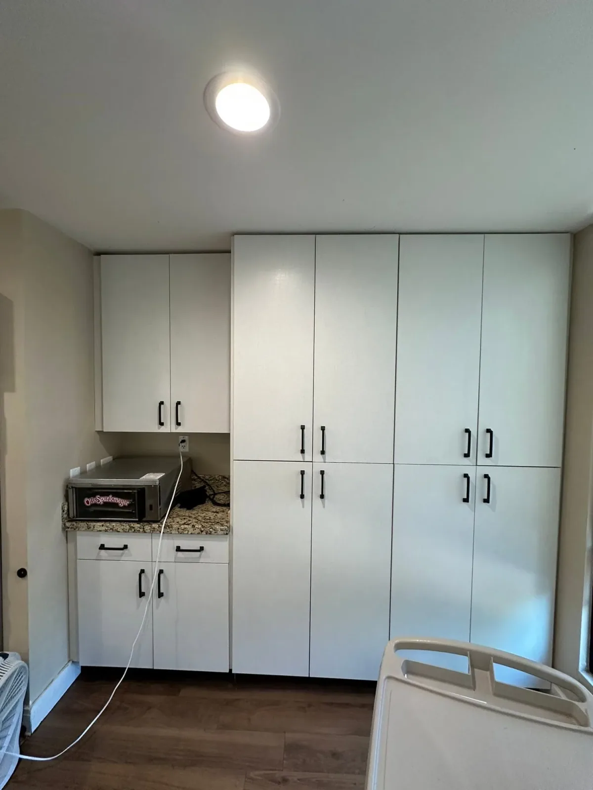 Tall storage cabinetry with custom cabinet doors by Ramos Cabinetry and Construction in Mesa, AZ