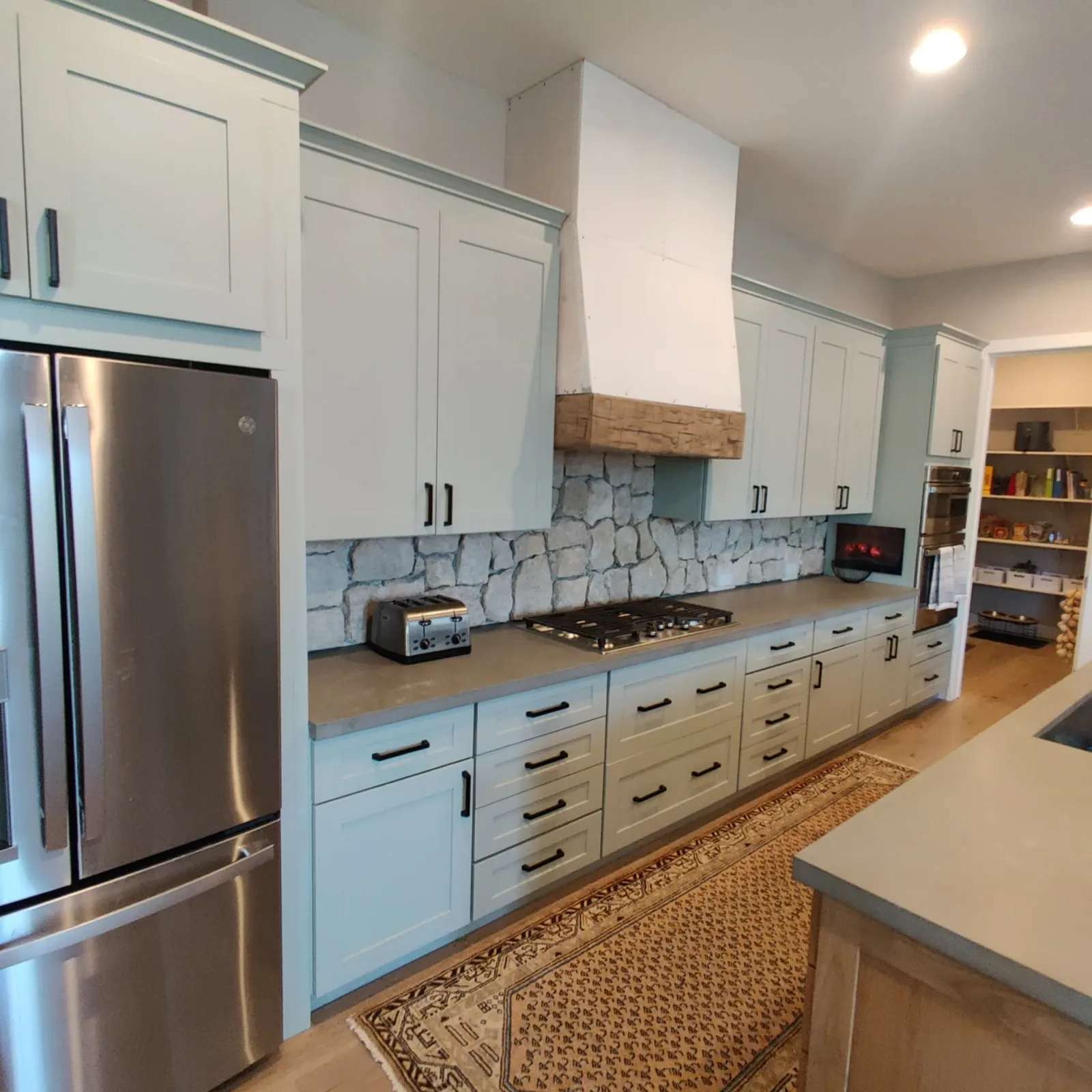 Laundry room cabinet storage and utility room cabinetry by Ramos Cabinetry and Construction in Chandler, AZ