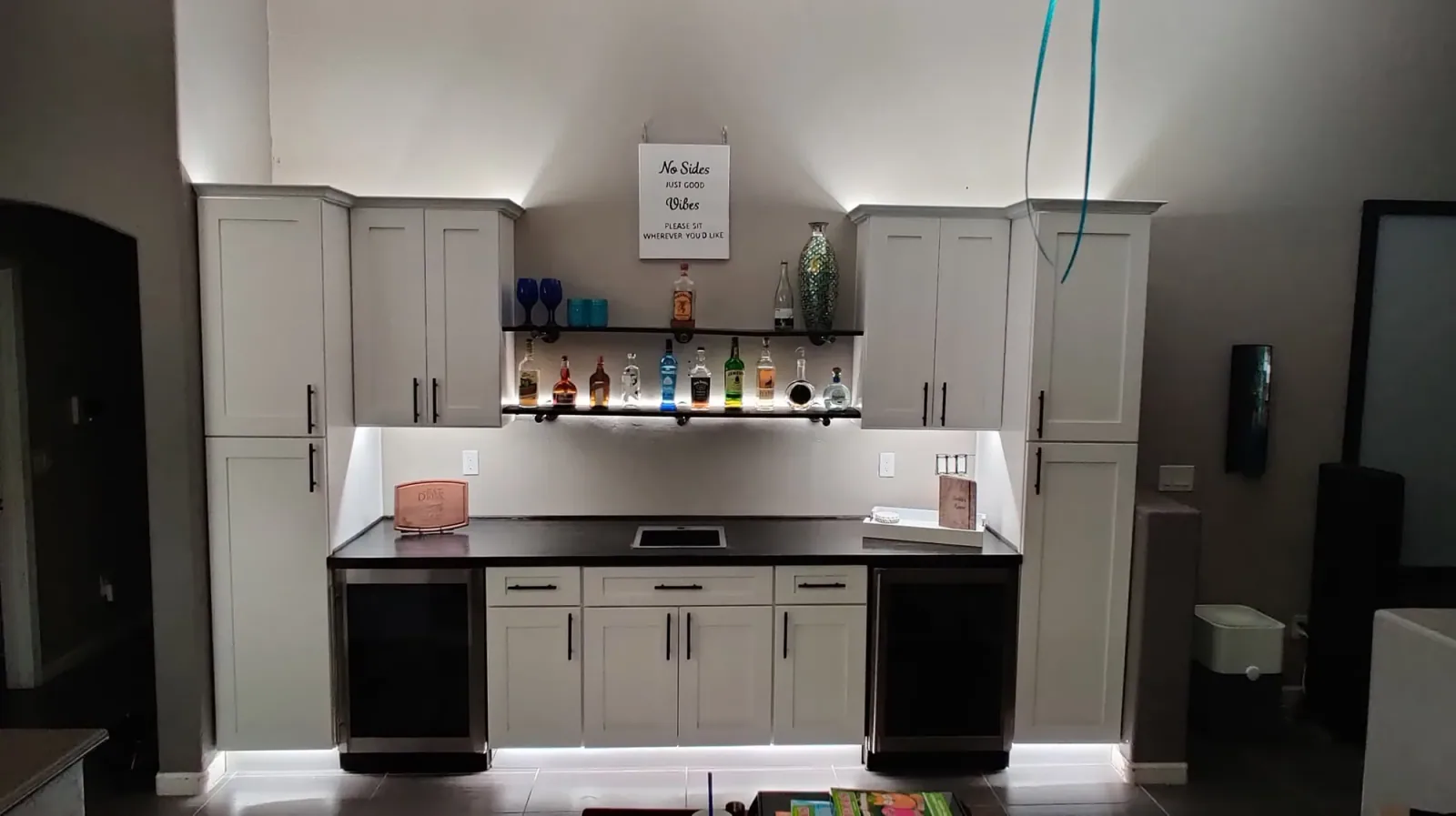 Custom wet bar cabinetry and built in storage by Ramos Cabinetry and Construction in Tempe, AZ